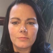 Tanya is female with dark shoulder length hair and brown eyes