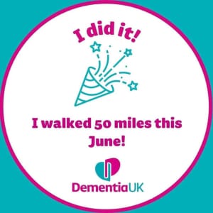 Tanya and Suzzanne's completion sticker. A white sticker with the text "I did it! I walked 50 miles this June" on it. It also has the Dementia UK logo on the bottom.