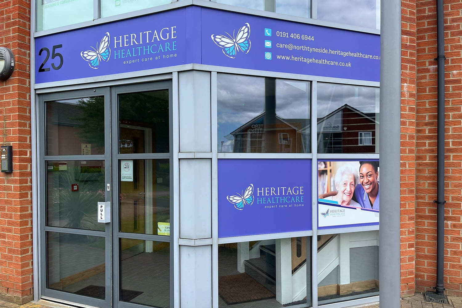 Heritage Healthcare North Tyneside - Heritage Healthcare signage across the top of the door Front facade of the new Heritage Healthcare North Tyneside office building, 25 Apex Business Village. The image shows the number 25 and Heritage Healthcare signage